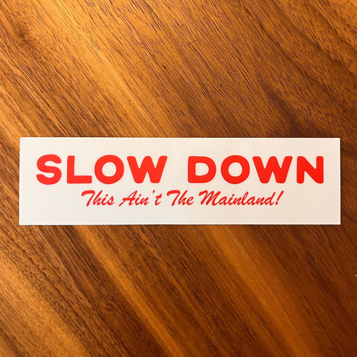 Slow Down This Ain't The Mainland - Bumper Sticker